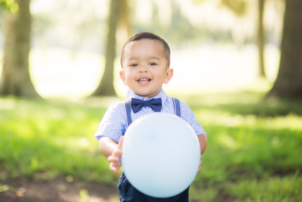 2 year old 2nd Birthday Photo Session - Our Long Life wearing bow tie and suspenders with balloon